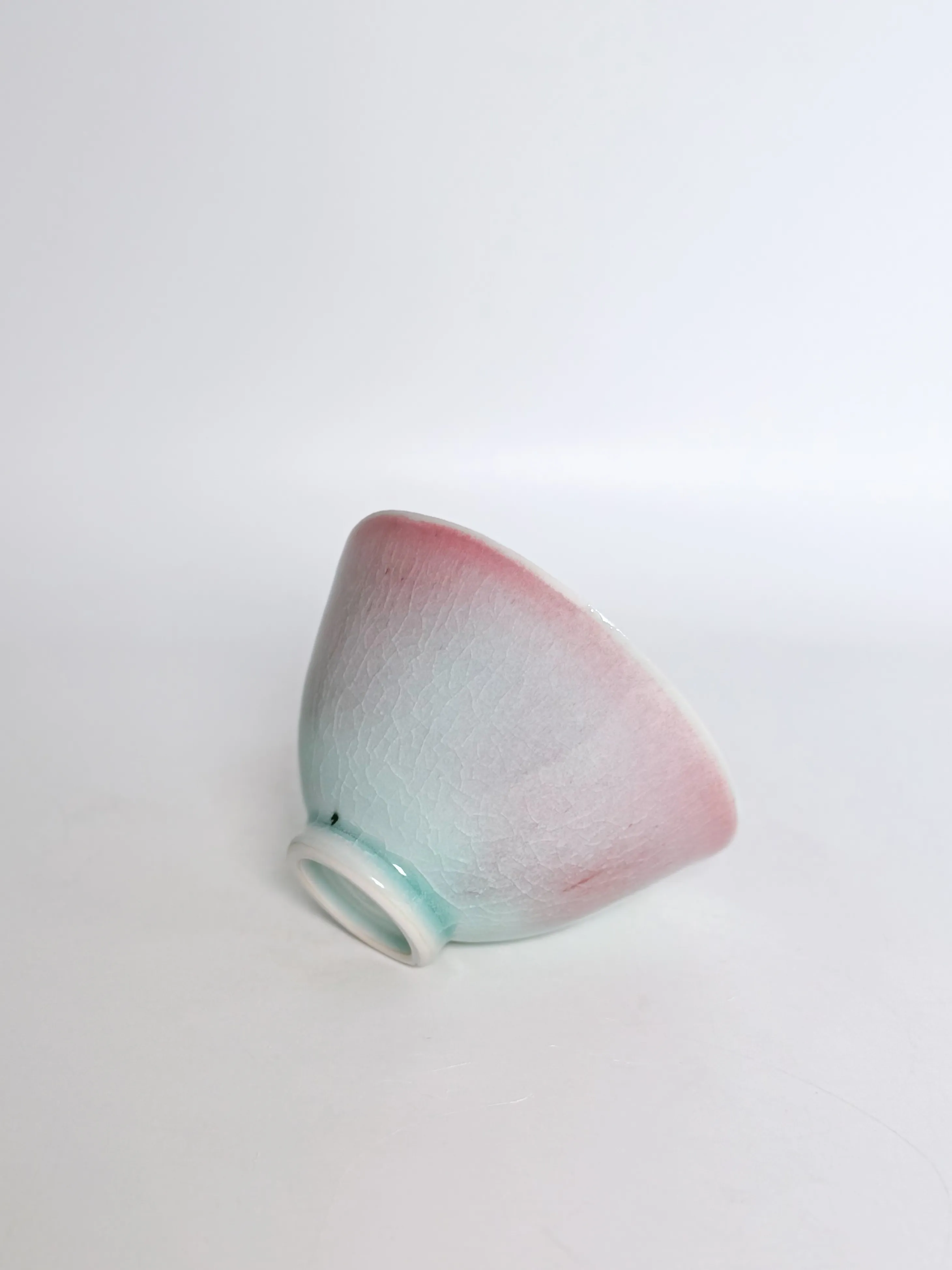 Blushed Celadon Teacup, studio view 1